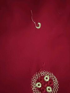 a beautiful red saree