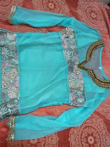 Elegant Teal Kurta Set with Intricate Embroidery