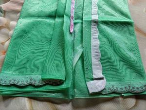 Elegant Sea Green Saree with White Lace