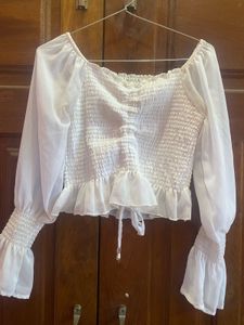 Chic White Smocked Blouse with Bell Sleeves