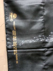Elegant Black Sareewith Rice Grain Print