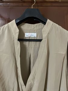 Elegant Sleeveless Drape Top