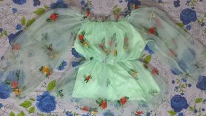 Romantic, fairycore-inspired mint green top