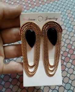 Elegant Gold Dangle Earrings with Black Stone