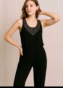 Elegant Black Jumpsuit with Embellished Neckline