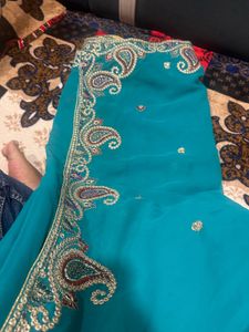Elegant Turquoise Embellished Saree