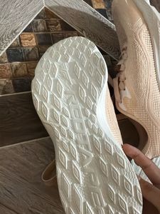peach color sneakers
