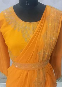 Elegant Orange Saree with Embellishments