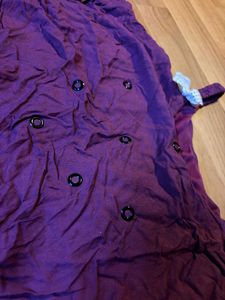 Purple Ruffled Camisole Top with cute bows on it