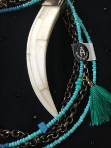 ivory tooth and Turquoise beads Necklace.