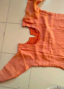 Orange Kurti with Embroidered Neckline
