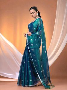 Viral Emerald Green Tissue Silk Saree