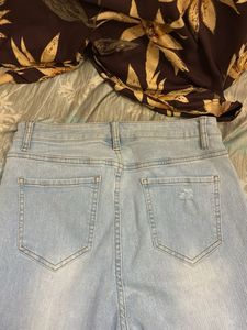 Light Wash Ripped Flare Jeans