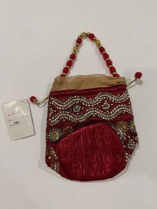 Brand new Maroon &amp; Embellished Potli Bag