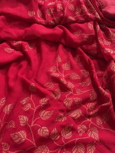 Elegant Pink Saree with Golden Leaf Print