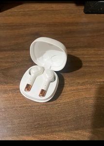 White Wireless Earbud + Charging + Case