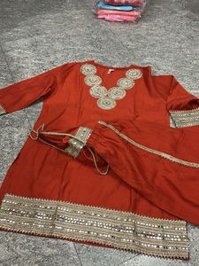 Red Embellished Kurta Set with Matching Potli Bag