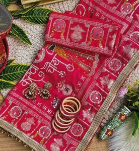 Vibrant Red Saree with Peacock Motif