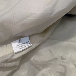 Cream Puffer Jacket with Green Collar