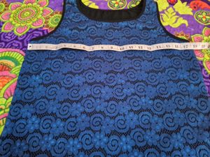 Elegant Blue Lace Top with Black Skirt
