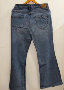Ripped Flare Jeans