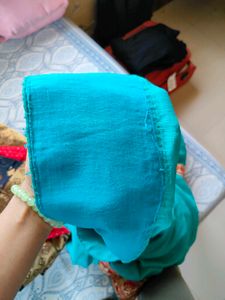 Elegant Teal Saree with Embroidered Border
