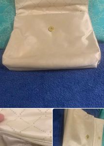 BVlgari Elegant Cream Clutch Bag