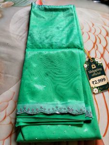 Elegant Sea Green Saree with White Lace