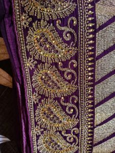 Elegant Purple Saree with Gold Stripes