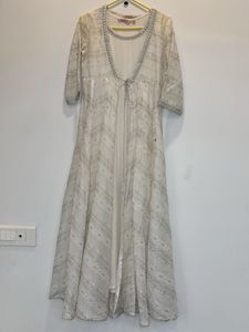 Elegant White Ethnic Gown with Silver Embellishmen