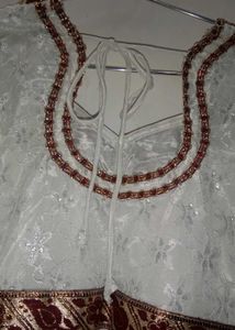 Elegant White Lace Gown with Red Trim