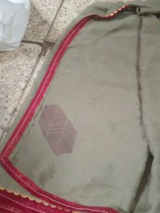 Elegant Grey Saree with Red Border used