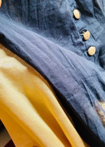 Sleeveless Black Chudidaar With Holden Buttons