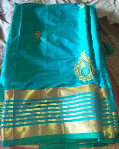 Elegant Teal Saree with Gold Border