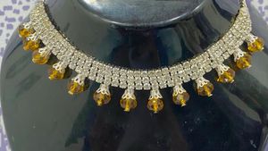 Elegant Necklace with Amber Colored Beads