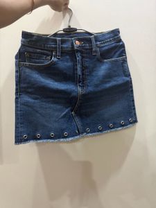Levi’s Blue Denim Mini Skirt with Grommets