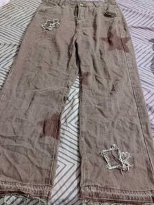 Distressed Taupe Jeans