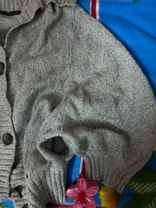 Gray Knit Cardigan Has Pocket Of Both Sides