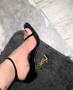 YSL opyum heels black and gold
