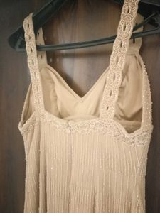 Eye-catching Beige Stap Dress Fully Loaded