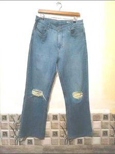Distressed Blue Denim Jeans