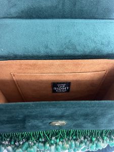 Elegant Green Suede Bag with Bamboo Handle