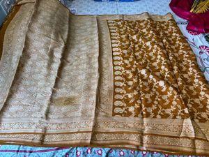 Elegant Brown Saree with Intricate Motifs
