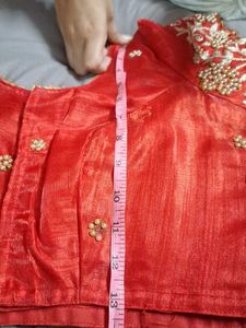 Red blouse with golden and pearl ambroidery