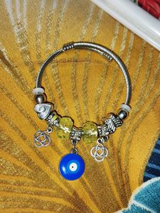 Charming Charm Bracelet with Yellow Beads