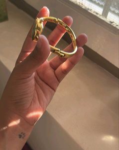 Elegant Gold Tone Kada Watch