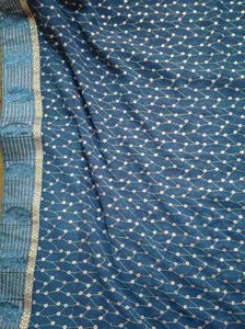 Elegant Teal Saree with White Polka Dots