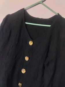 Chic Black Textured Crop Top with Gold Buttons