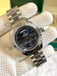 Rolex  day and date watch ⌚