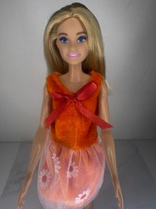 Reserved Barbie Doll in Orange Dress
